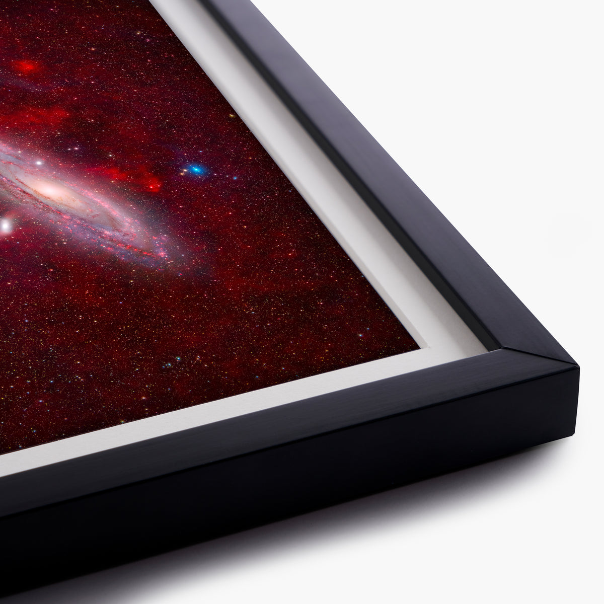 M31 Immersed in Cosmic Clouds of Glowing Ionized Hydrogen