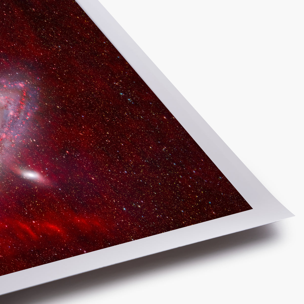 M31 Immersed in Cosmic Clouds of Glowing Ionized Hydrogen